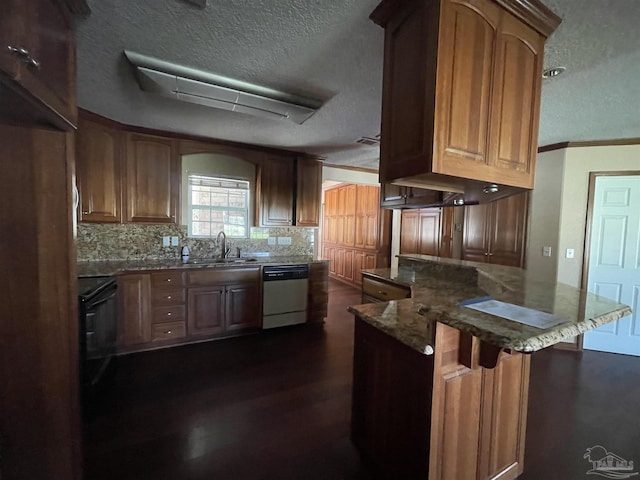 kitchen with a breakfast bar, sink, dark hardwood / wood-style floors, dishwasher, and backsplash