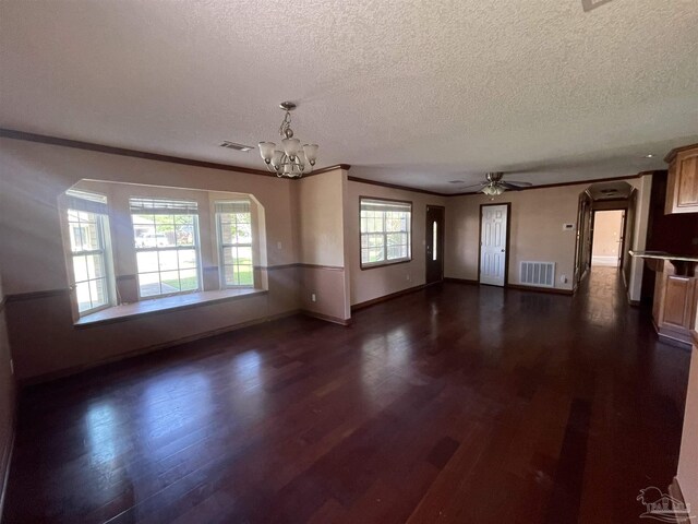 unfurnished living room featuring dark wood-type flooring, crown molding, ceiling fan with notable chandelier, and a textured ceiling