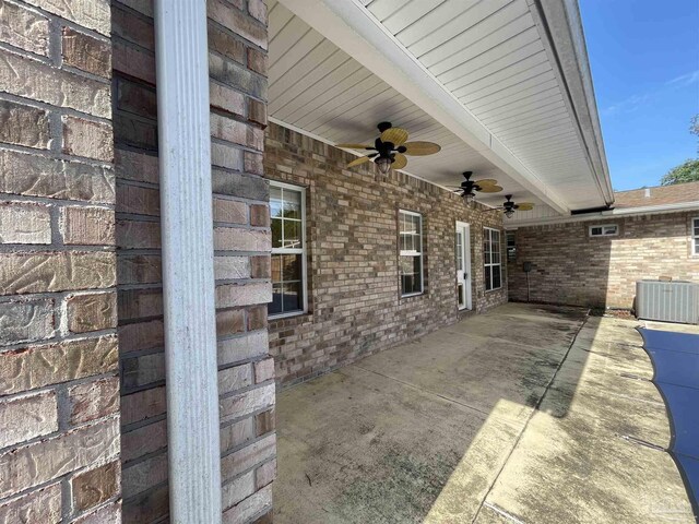 view of patio / terrace featuring ceiling fan and cooling unit