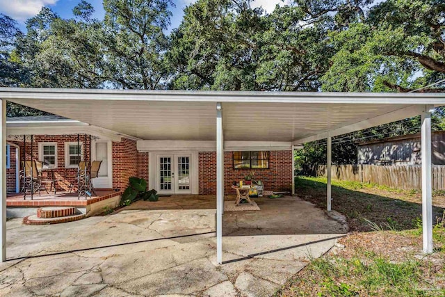 view of patio featuring french doors and covered porch