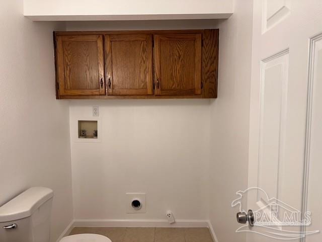 2301 W Michigan Ave Unit 25, Pensacola, FL 32526 - laundry room featuring hookup for a washing machine, electric dryer hookup, cabinet space, tile patterned floors, and gas dryer hookup