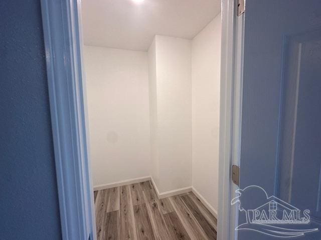 2301 W Michigan Ave Unit 25, Pensacola, FL 32526 - walk in closet with wood finished floors
