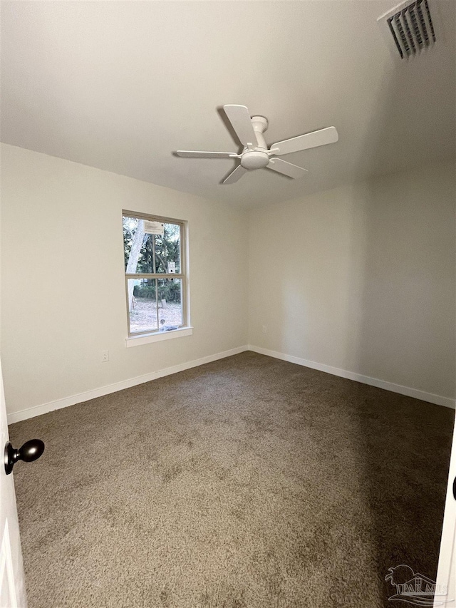 empty room with carpet flooring and ceiling fan