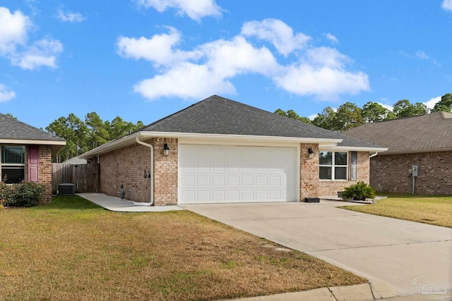 ranch-style home with central AC, a front lawn, and a garage