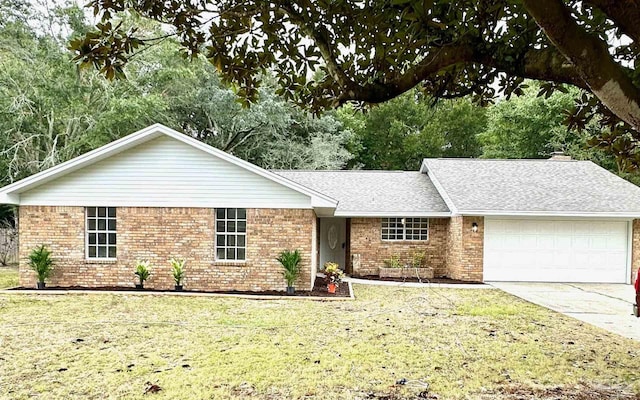 single story home with a front lawn and a garage