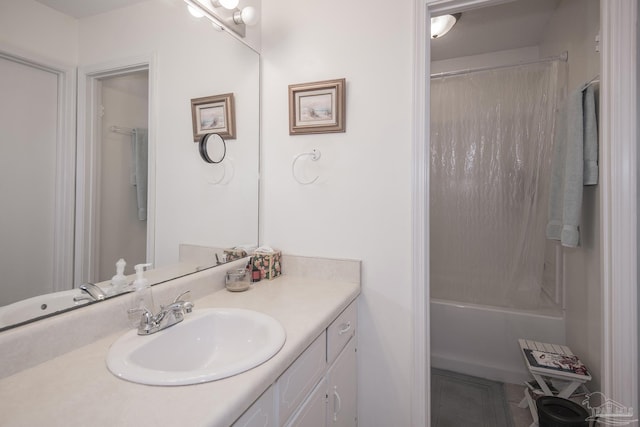 bathroom with shower / bath combination with curtain and vanity