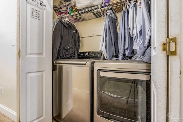 laundry area featuring washer and clothes dryer