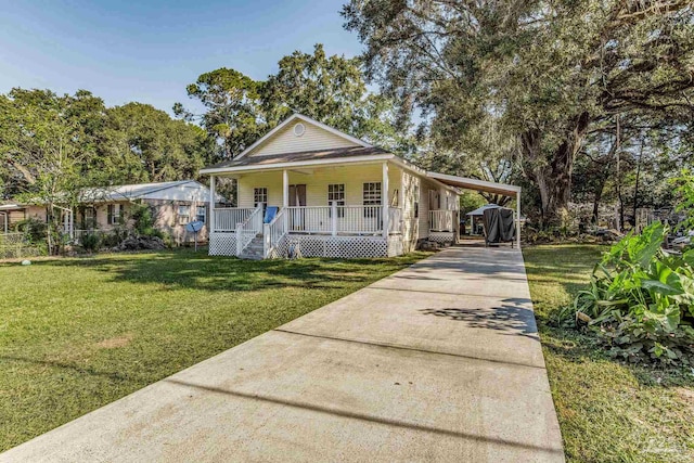 view of front of house featuring a front yard, a carport, and a porch