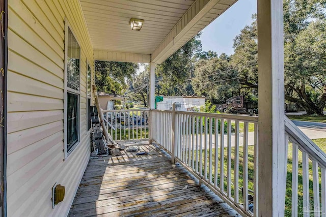 wooden deck featuring a porch