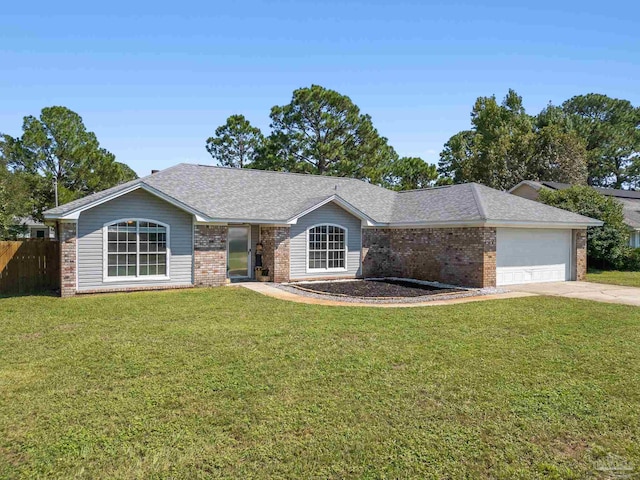 ranch-style home featuring a front yard and a garage