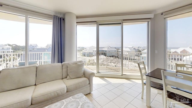 living room featuring light tile patterned floors and a residential view