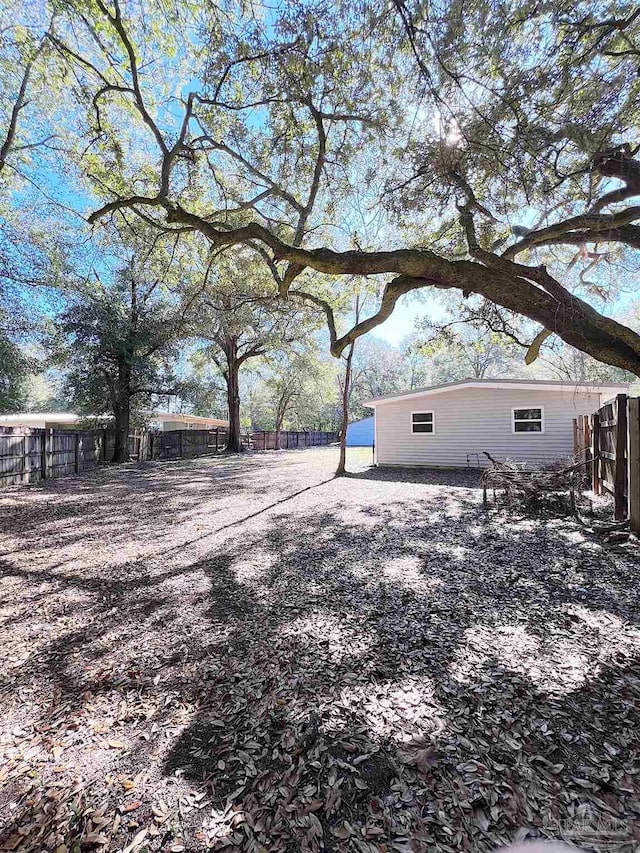 view of yard featuring a fenced backyard