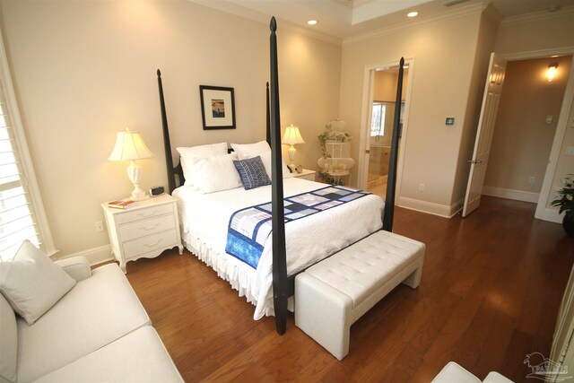 bedroom featuring multiple windows, crown molding, and dark wood-style flooring