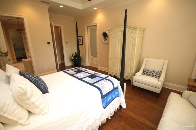 bedroom featuring baseboards, recessed lighting, ornamental molding, and dark wood finished floors