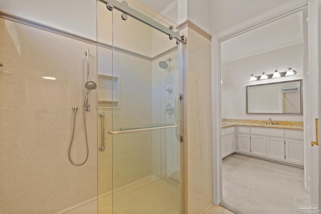 bathroom featuring an enclosed shower and vanity