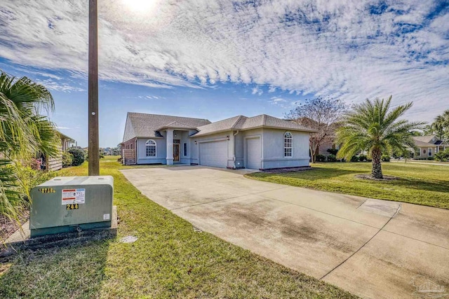 ranch-style home with a front yard and a garage