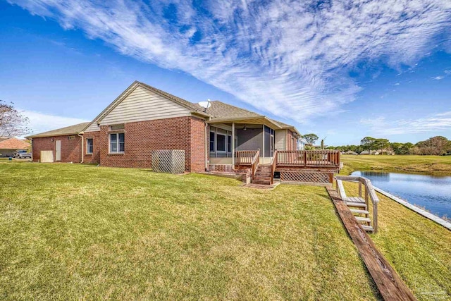 view of property exterior with a lawn and a water view