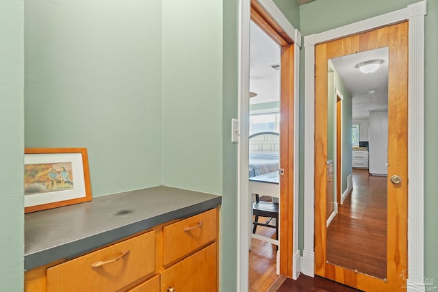 hall featuring dark hardwood / wood-style flooring