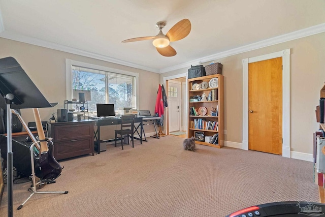 carpeted office featuring ceiling fan and ornamental molding