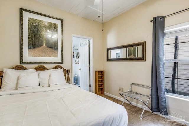 bedroom with ceiling fan and carpet floors