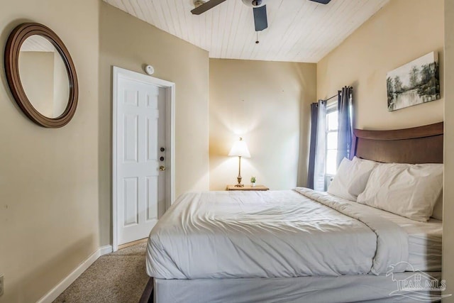 carpeted bedroom featuring wood ceiling and ceiling fan