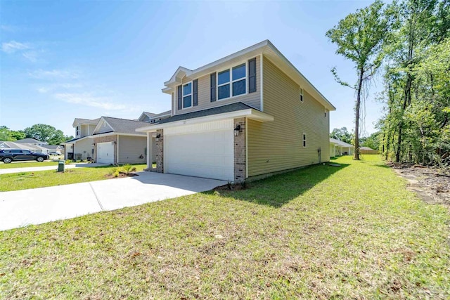 view of front of house featuring a garage and a front yard