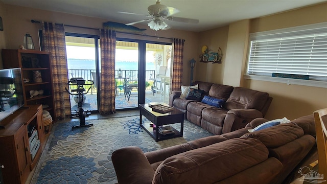 living area with ceiling fan