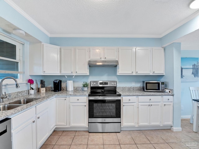 kitchen with sink, white cabinetry, stainless steel appliances, a textured ceiling, and light tile patterned flooring