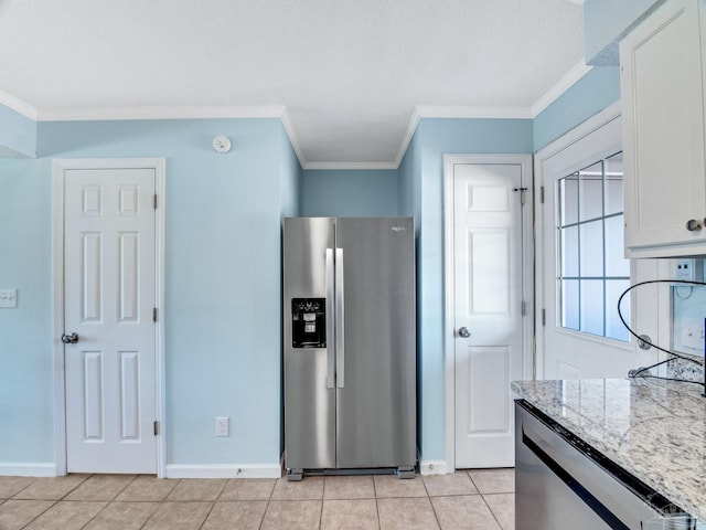 kitchen with light tile patterned floors, crown molding, white cabinetry, light stone countertops, and stainless steel fridge with ice dispenser