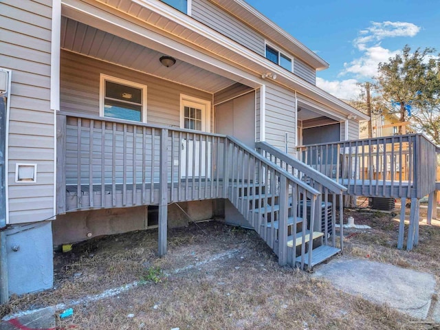 entrance to property with a deck