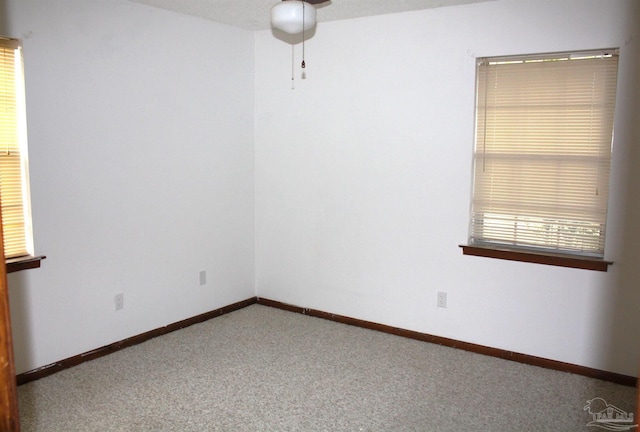 unfurnished room featuring carpet floors