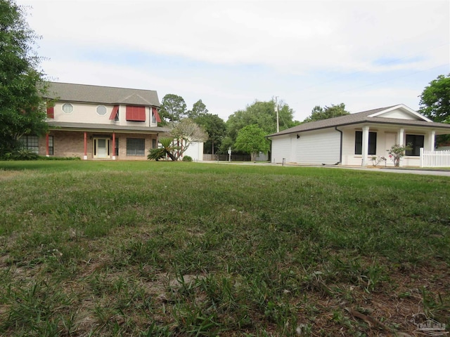 view of yard featuring covered porch