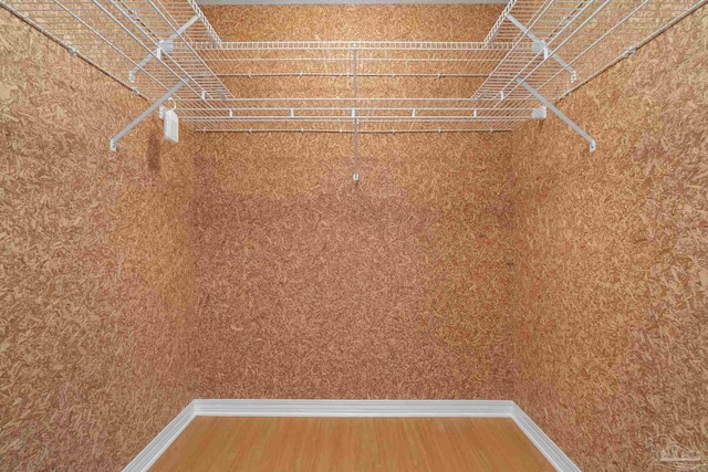 1180 Lionsgate Ln, Gulf Breeze, FL 32563 - spacious closet featuring wood finished floors