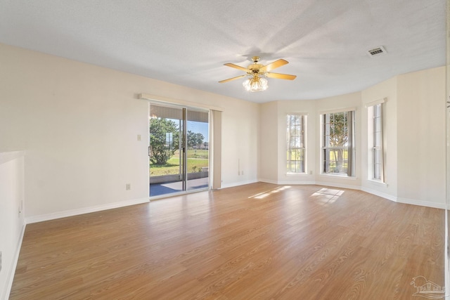 1180 Lionsgate Ln, Gulf Breeze, FL 32563 - spare room featuring a ceiling fan and light wood-style flooring