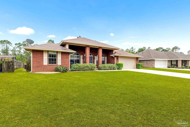 11532 Aruba Dr, Pensacola, FL 32506 - prairie-style house featuring an attached garage, brick siding, a front yard, and concrete driveway