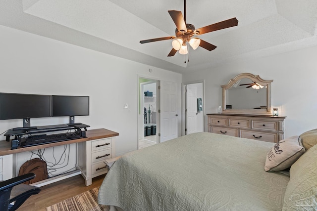 bedroom featuring dark wood-style floors and a ceiling fan