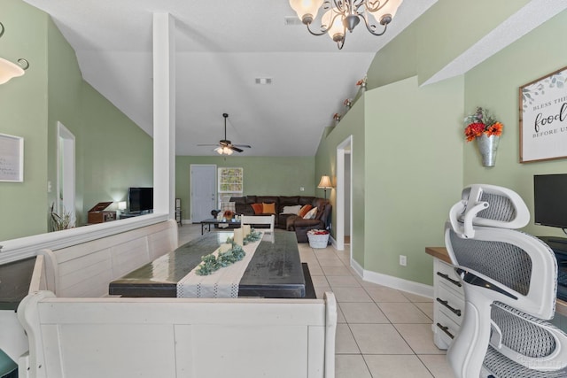 kitchen featuring light tile patterned floors, white cabinets, lofted ceiling, open floor plan, and ceiling fan with notable chandelier