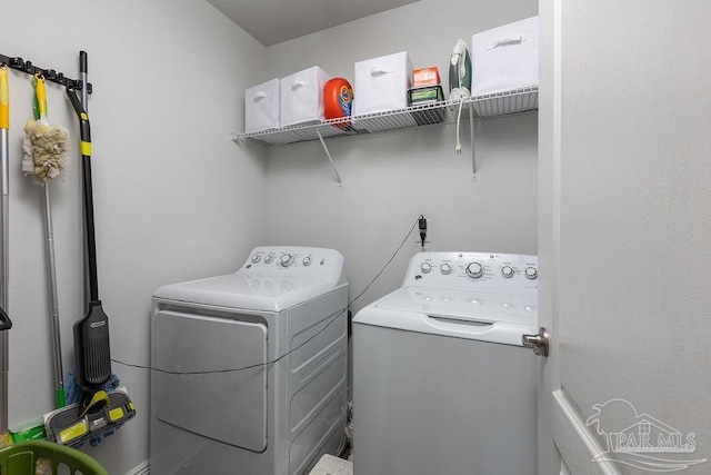 laundry area featuring separate washer and dryer