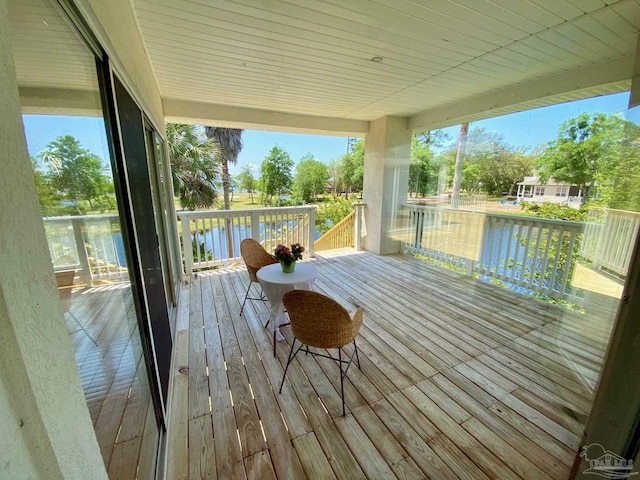 7208 Bayshore Dr, Milton, FL 32583 - wooden terrace featuring a water view
