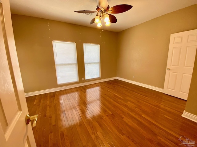 7208 Bayshore Dr, Milton, FL 32583 - unfurnished room with wood-type flooring, baseboards, and ceiling fan