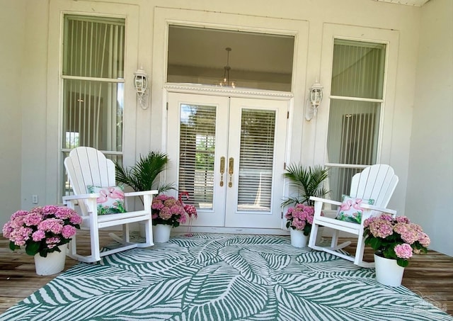 7208 Bayshore Dr, Milton, FL 32583 - doorway to property featuring french doors and a porch