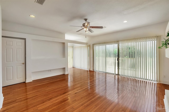 7208 Bayshore Dr, Milton, FL 32583 - spare room with ceiling fan, hardwood / wood-style floors, recessed lighting, and baseboards