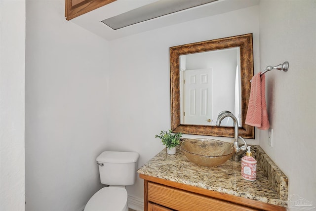 7208 Bayshore Dr, Milton, FL 32583 - bathroom with vanity and toilet