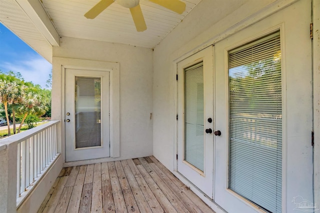 7208 Bayshore Dr, Milton, FL 32583 - wooden deck with a ceiling fan and french doors