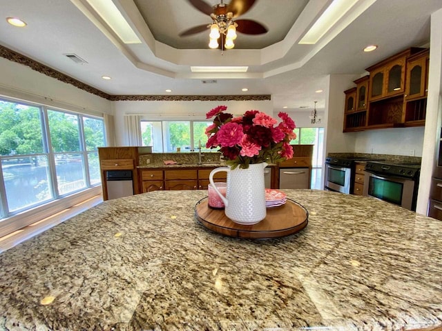 7208 Bayshore Dr, Milton, FL 32583 - kitchen featuring stainless steel electric range oven, plenty of natural light, a sink, ceiling fan, and recessed lighting