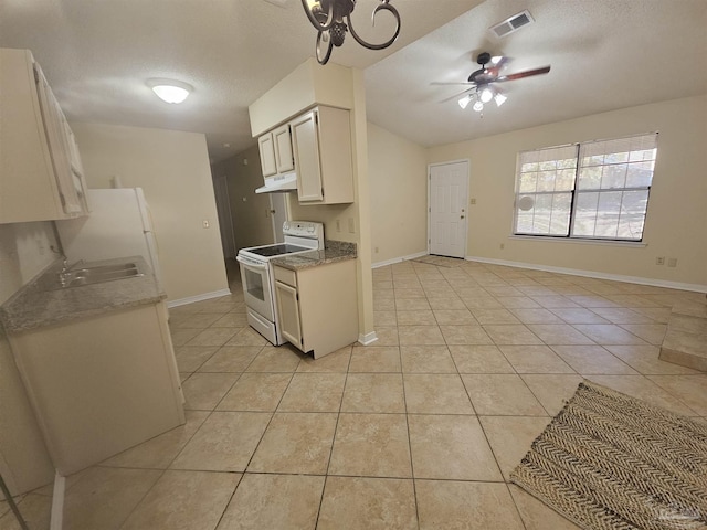 kitchen featuring white electric range oven, sink, a textured ceiling, light tile patterned floors, and ceiling fan