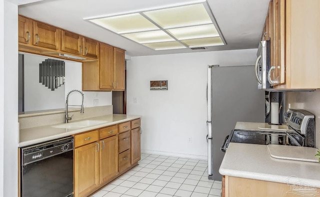 kitchen with sink, light tile patterned floors, black dishwasher, and range