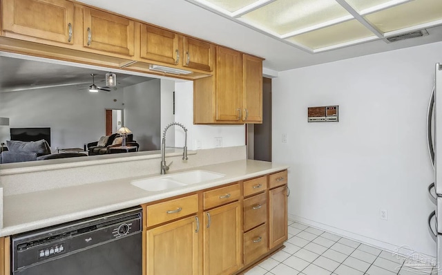 kitchen featuring ceiling fan, sink, light tile patterned floors, and black dishwasher