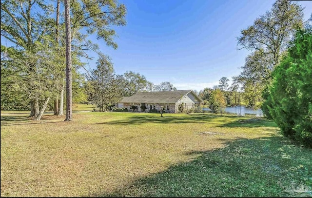 view of yard with a water view