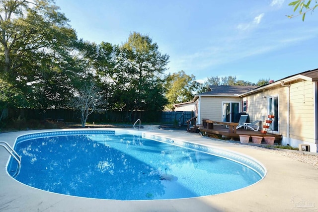 view of pool featuring a wooden deck